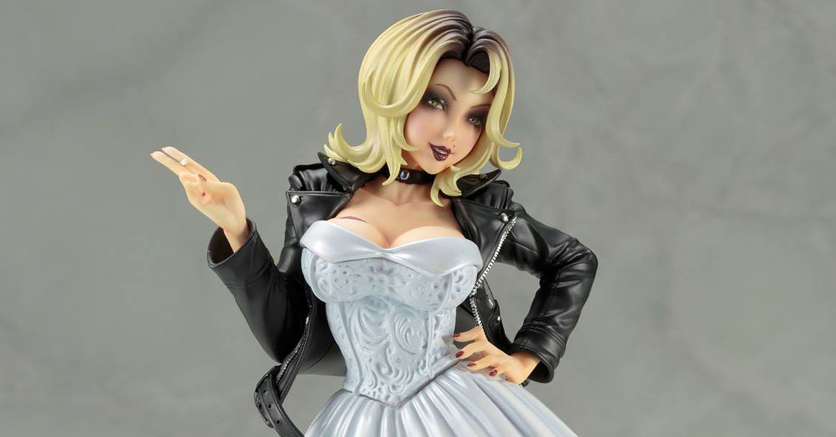 A detailed Bishoujo-style statue of Tiffany, the Bride of Chucky, from the Child’s Play horror series. The figure, designed by Kotobukiya, portrays Tiffany with her iconic blonde hairstyle, dark makeup, and edgy look. She wears a black leather jacket over a white bridal dress with intricate details, standing with a confident pose and a smirk. Her gothic style and feminine details bring out the character's blend of allure and menace, making it a striking piece for horror fans.